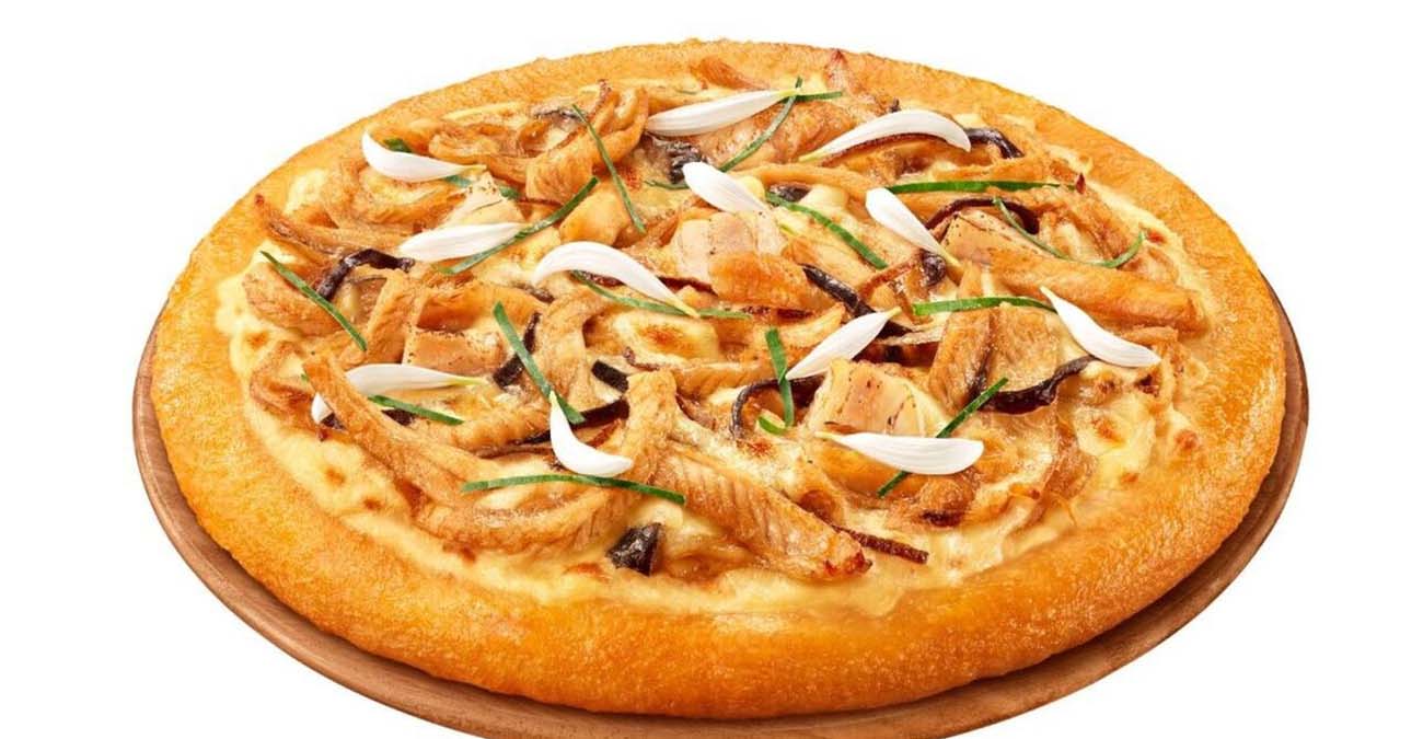 Μαύρα μανιτάρια, κινέζικο ζαμπόν και... φίδι: Νέα πίτσα για τολμηρούς στο Χονγκ Κονγκ